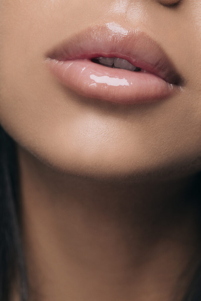 Close up of natural lips and smooth highlighting skin enhancement, skincare and beauty aesthetics